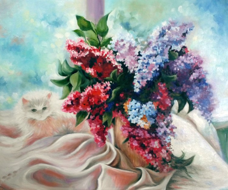 Кошечка в цветах