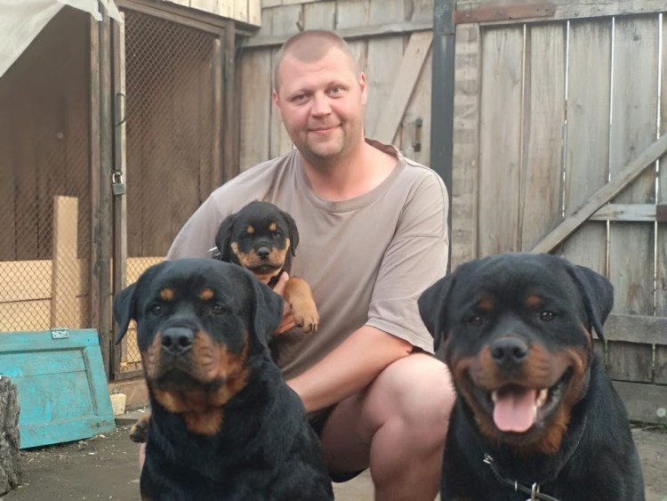 Женщина с ротвейлером