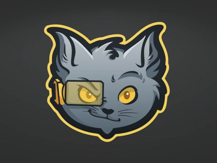 Кот сидит за компьютером