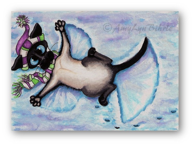 Сиамский кот под елкой