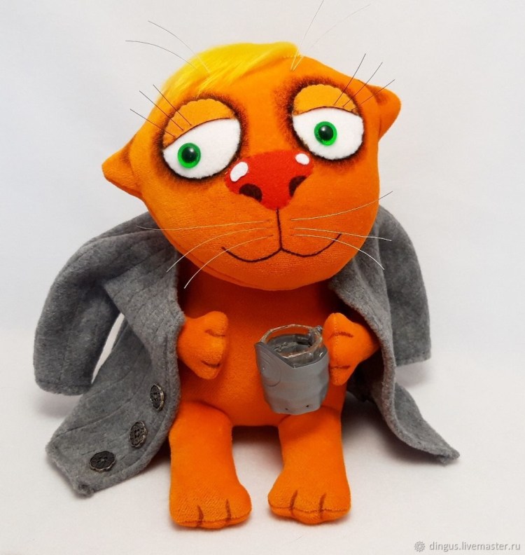 Плюшевый рыжий кот