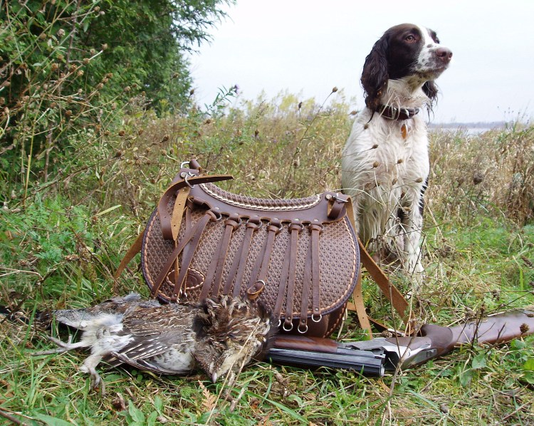 Охотник с собакой